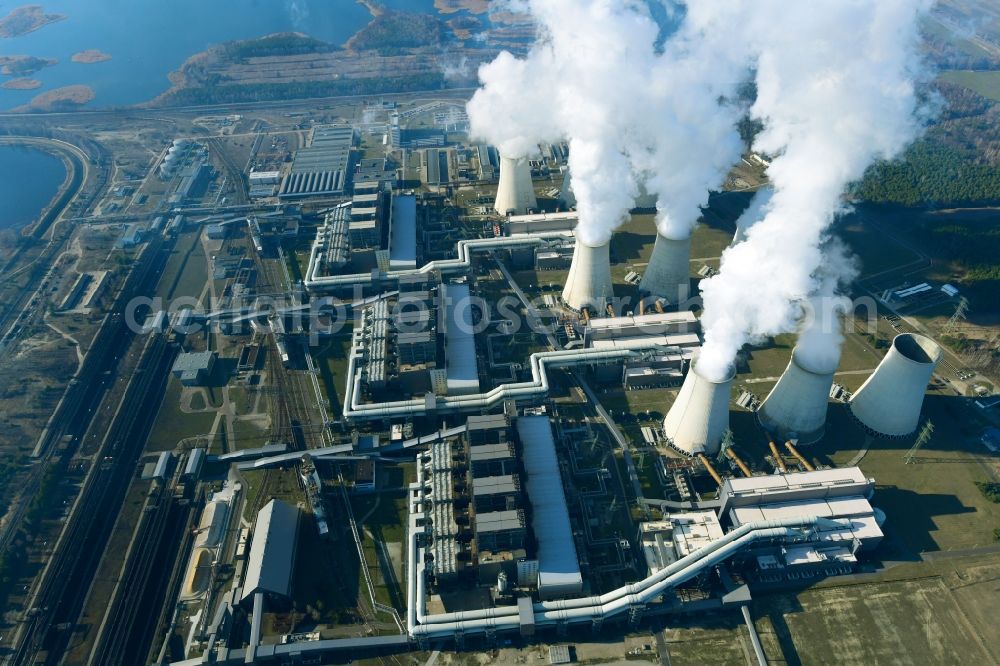 Aerial photograph Teichland - Clouds of exhaust gas in the cooling towers of the power plant Jaenschwalde, a lignite-fired thermal power plant in southeastern Brandenburg. Power plant operator is to Vattenfall Europe belonging Vattenfall Europe Generation AG, which emerged from VEAG