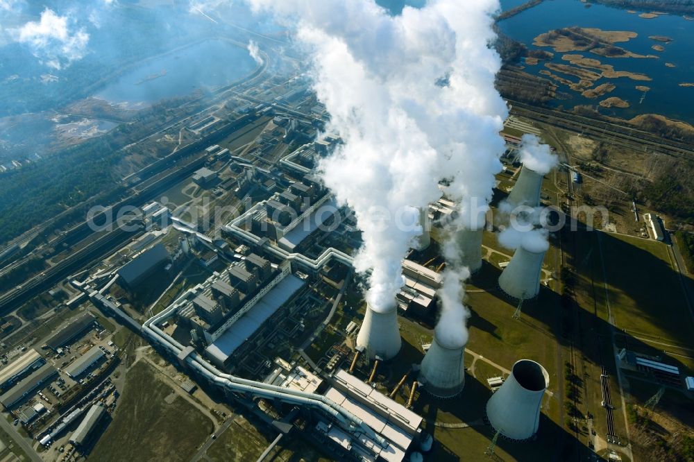 Aerial image Teichland - Clouds of exhaust gas in the cooling towers of the power plant Jaenschwalde, a lignite-fired thermal power plant in southeastern Brandenburg. Power plant operator is to Vattenfall Europe belonging Vattenfall Europe Generation AG, which emerged from VEAG