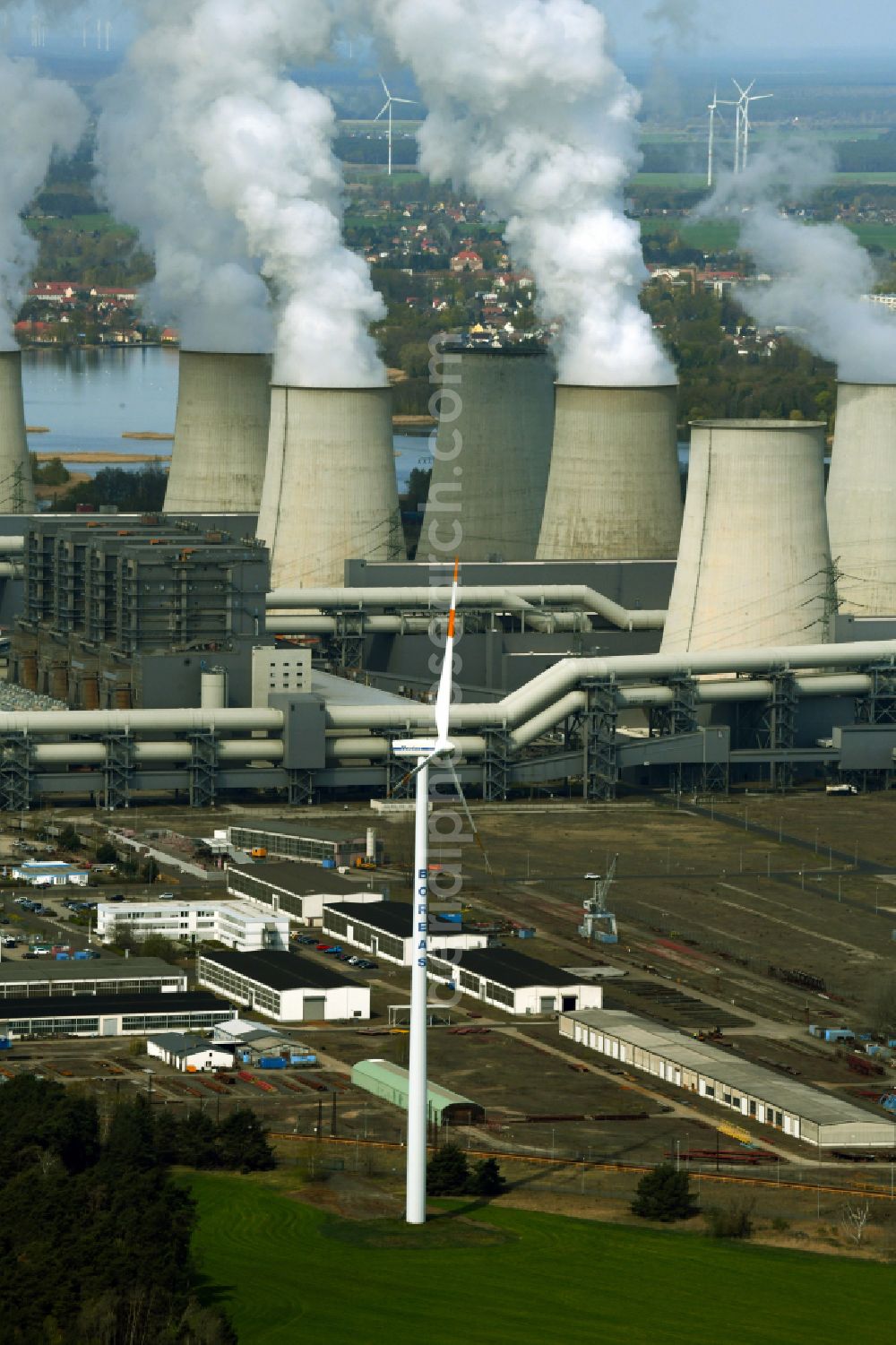 Aerial image Teichland - Clouds of exhaust gas in the cooling towers of the power plant Jaenschwalde, a lignite-fired thermal power plant in southeastern Brandenburg. Power plant operator is to Vattenfall Europe belonging Vattenfall Europe Generation AG, which emerged from VEAG