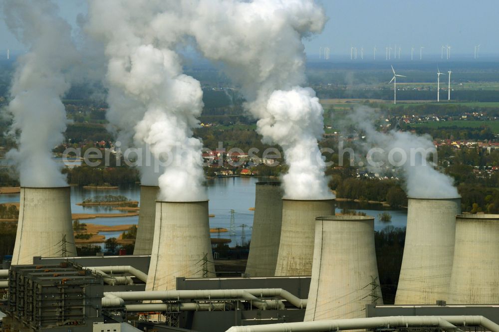 Aerial photograph Teichland - Clouds of exhaust gas in the cooling towers of the power plant Jaenschwalde, a lignite-fired thermal power plant in southeastern Brandenburg. Power plant operator is to Vattenfall Europe belonging Vattenfall Europe Generation AG, which emerged from VEAG