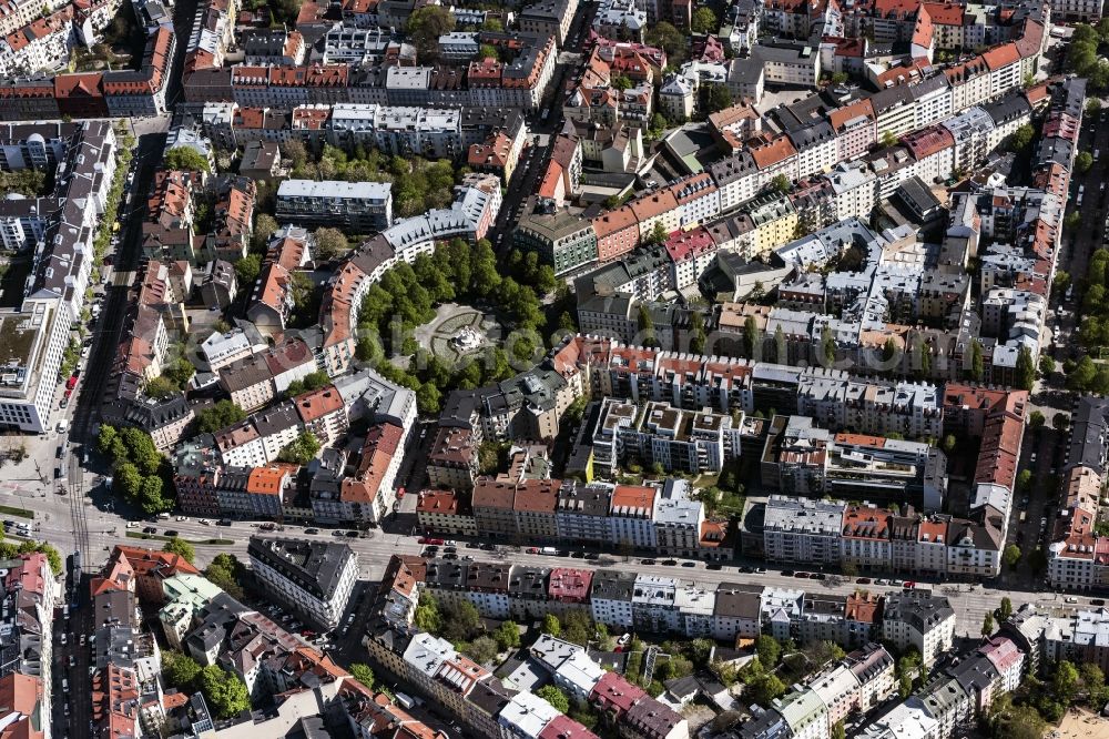 München from above - Weissenburger place in Munich Haidhausen in the state Bavaria. Flowerbeds are created concentrically to the Glaspalast fountain in the middle of the square. For Weissenburger Platz lead Metzstrasse, Weissenburger Strasse and Lothringerstrasse