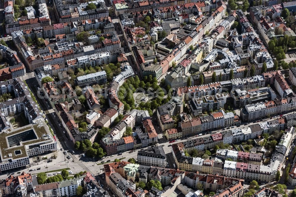 Aerial image München - Weissenburger place in Munich Haidhausen in the state Bavaria. Flowerbeds are created concentrically to the Glaspalast fountain in the middle of the square. For Weissenburger Platz lead Metzstrasse, Weissenburger Strasse and Lothringerstrasse