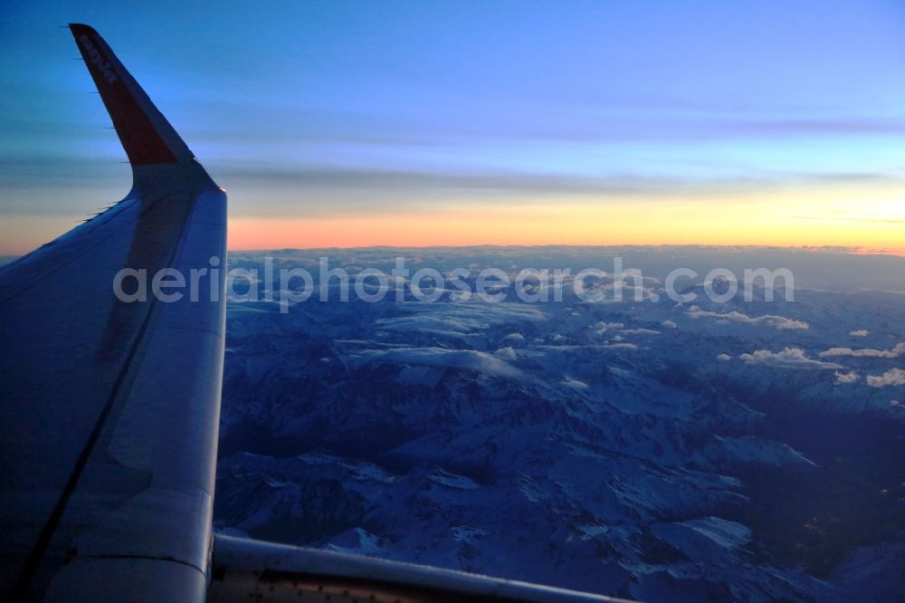 Aerial image Brot-Plamboz - White and snowy peaks des Alpenkammes der Schweizer Jura in the rocky and mountainous landscape in Brot-Plamboz in Neuchatel, Switzerland