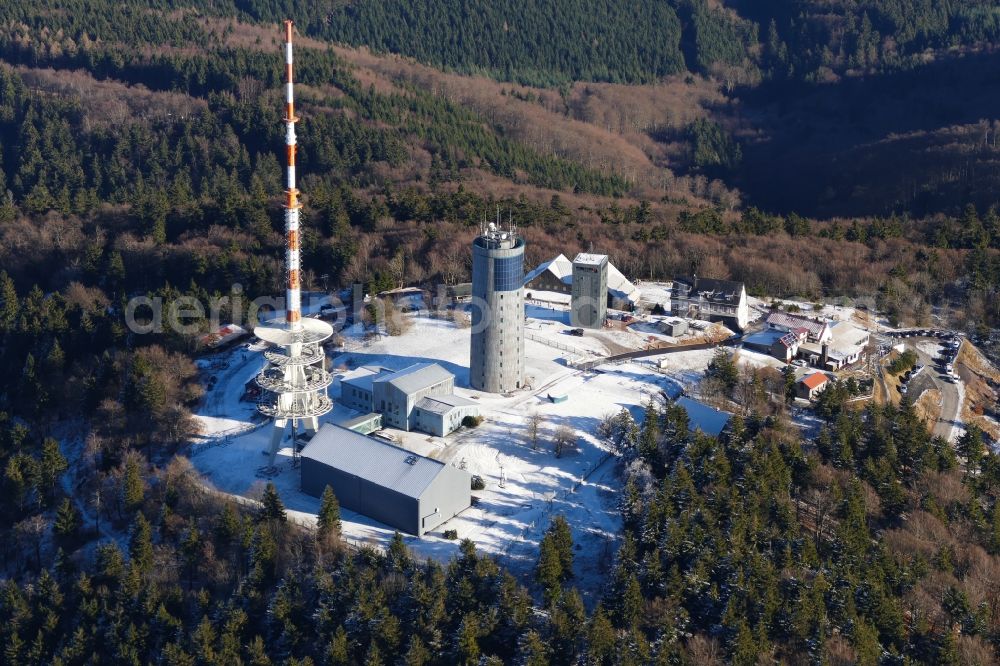 Aerial image Kurort Brotterode - White and snowy peaks of the Inselsberg in the rocky and mountainous landscape Thueringer Wald in Kurort Brotterode in the state Thuringia