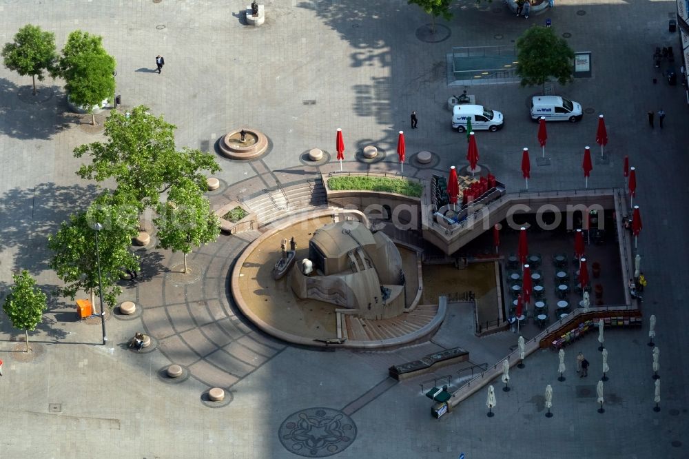 Berlin from above - Weltkugelbrunnen fountain on Breitscheidplatz in Berlin in Germany. The Weltkugelbrunnen is a well near the Europa-Center at the square Breitscheidplatz