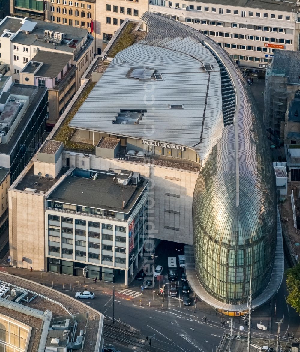 Aerial photograph Köln - Weltstadthaus (Metropolitan House) of the Peek & Cloppenburg company in Koeln in the state of North Rhine-Westphalia. The shopping building on Schilder Street was designed by the architect Renzo Piano and has a ship-like shape with glas facade. The mall is run by the fashion company and chain Peek&Cloppenburg