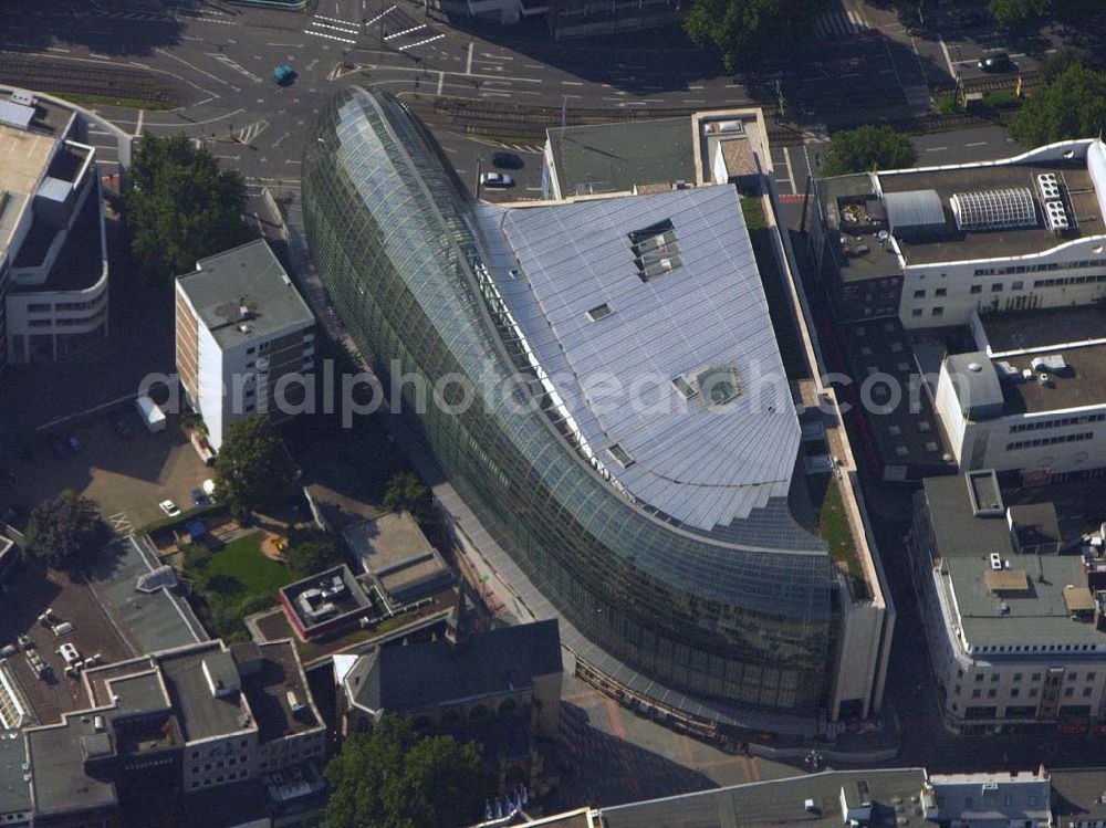 Aerial image Köln (NRW) - Blick auf das neue von der Peek & Cloppenburg KG Düsseldorf erbaute Weltstadthaus in der Kölner Innenstadt. Der Glaspalast mit seinem ovalen Grundriss und seiner schalenförmigen Fassade wurde von dem Architekten Renzo Piano erschaffen. Ab September wird auf rund 14.200 Quadratmetern Verkaufsfläche und fünf Etagen Damen-, Herren- und Kindermode vertrieben. Peek & Cloppenburg KG, Weltstadthaus, Köln - Schildergasse, 50667 Köln, Schildergasse 65-67, 0221 - 453900