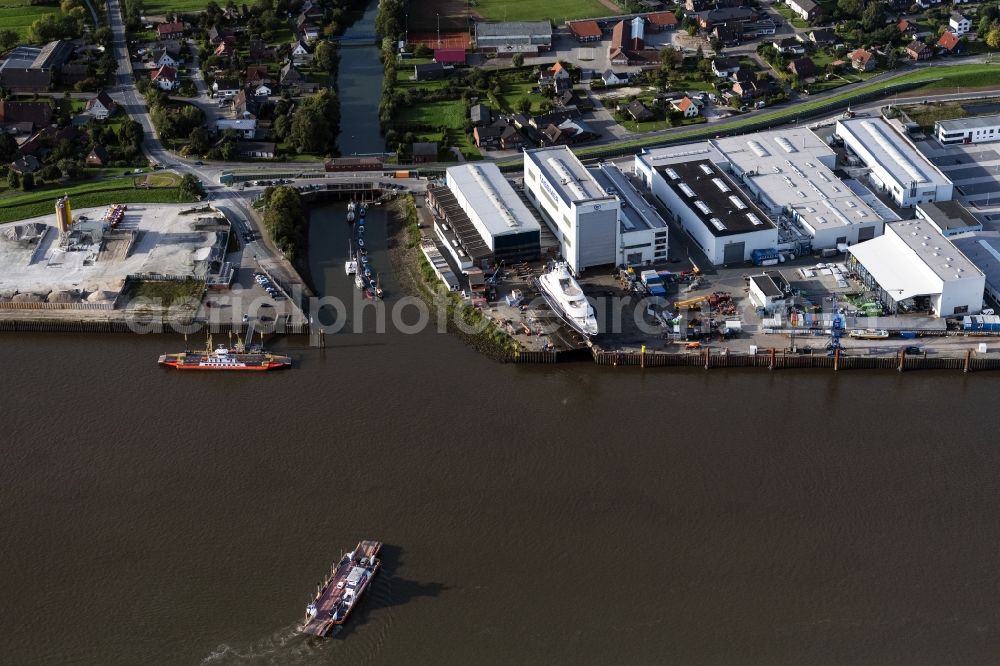 Aerial photograph Berne - Shipyard - site of the Firma Fassmer on Ufer of Weser in Berne in the state Lower Saxony, Germany