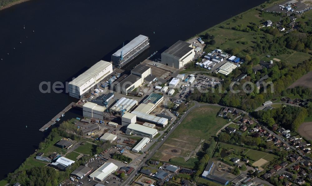 Schacht-Audorf from the bird's eye view: Shipyard - site of the Luerssen Kroeger Werft GmbH & Co. KG on Huettenstrasse in Schacht-Audorf in the state Schleswig-Holstein, Germany