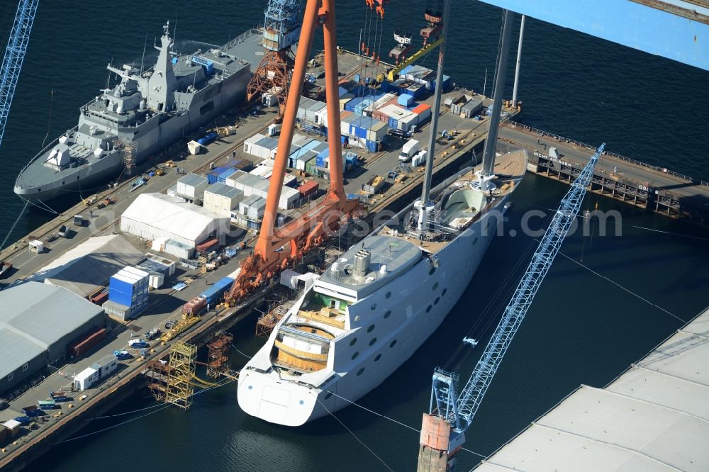 Kiel from above - Shipyard - site of the ThyssenKrupp Marine Systems GmbH in Kiel in the state Schleswig-Holstein. In Dock Kiel superyacht shipyard Nobiskrug German Naval Yards is the luxury - yacht 787 new building with the project name White Pearl