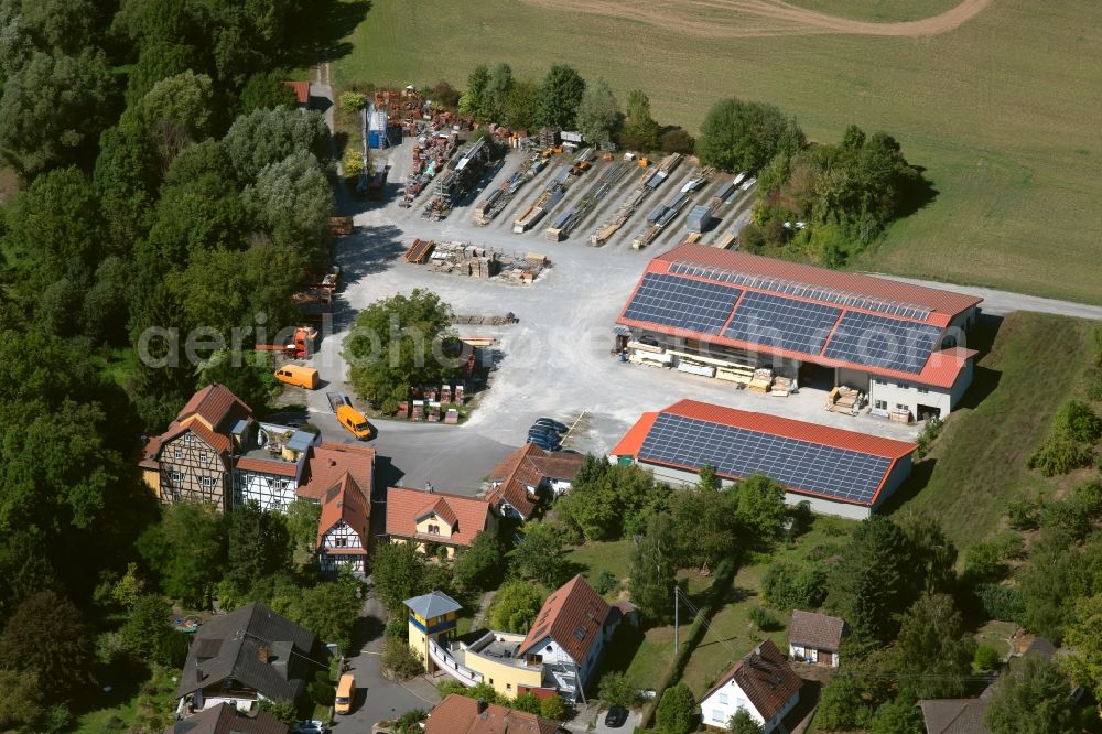 Lauda-Königshofen from the bird's eye view: Building and production halls on the premises Aeckerle Holzbau GmbH at Forellenweg in Lauda-Koenigshofen in the state Baden-Wurttemberg, Germany