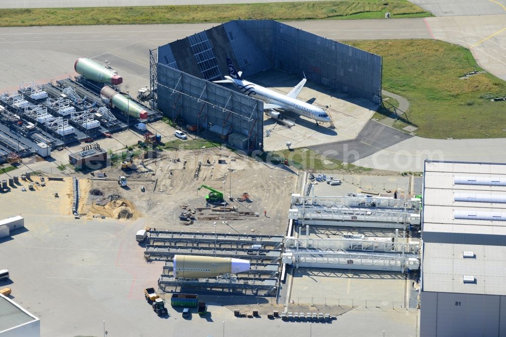 Hamburg from the bird's eye view: Views of the sound protection facility for engine test runs with an airplane type Airbus A320-200 on the Hamburg - Finkenwerder airfield on the premises of Airbus Germany GmbH