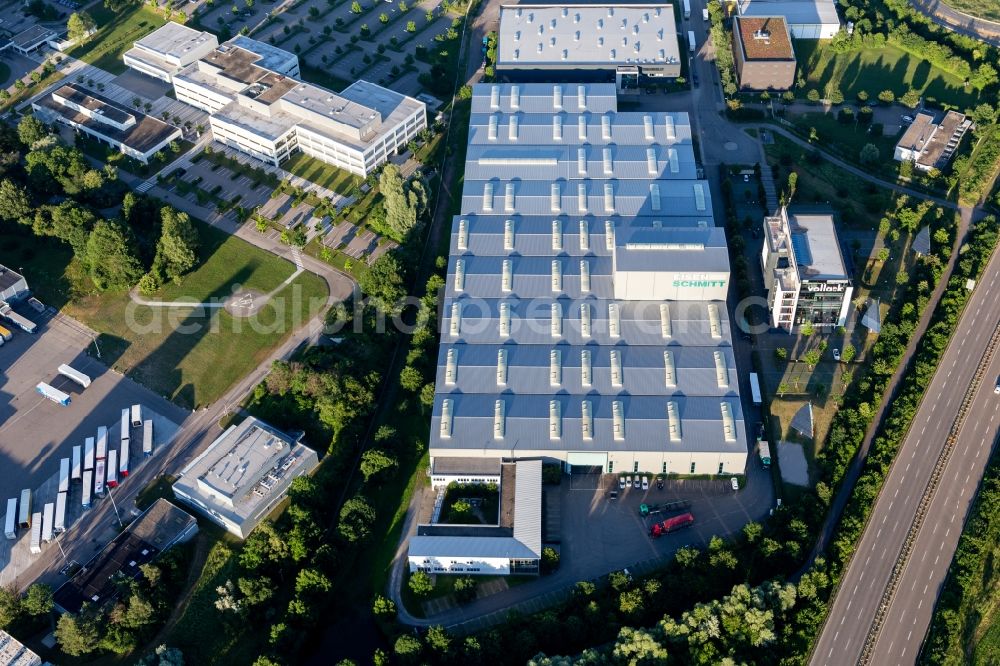 Karlsruhe from the bird's eye view: Building and production halls on the premises of Alois Schmitt GmbH & Co. KG and Vollack Gruppe in the district Durlach in Karlsruhe in the state Baden-Wurttemberg, Germany