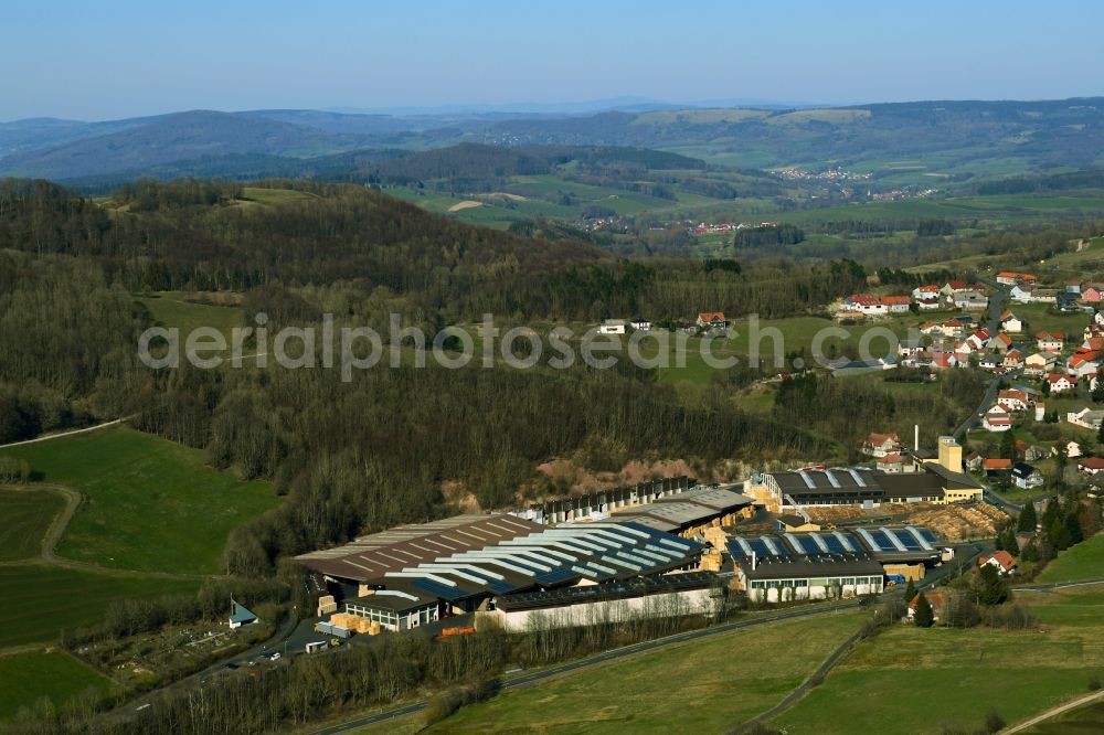 Poppenhausen (Wasserkuppe) from above - Building and production halls on the premises of Aloysius Krenzer GmbH & Co. KG on Wasserkuppenstrasse in the district Abtsroda in Poppenhausen (Wasserkuppe) in the state Hesse, Germany