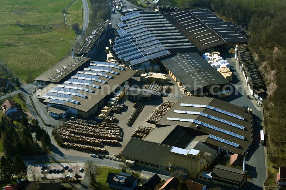 Aerial image Poppenhausen (Wasserkuppe) - Building and production halls on the premises of Aloysius Krenzer GmbH & Co. KG on Wasserkuppenstrasse in the district Abtsroda in Poppenhausen (Wasserkuppe) in the state Hesse, Germany