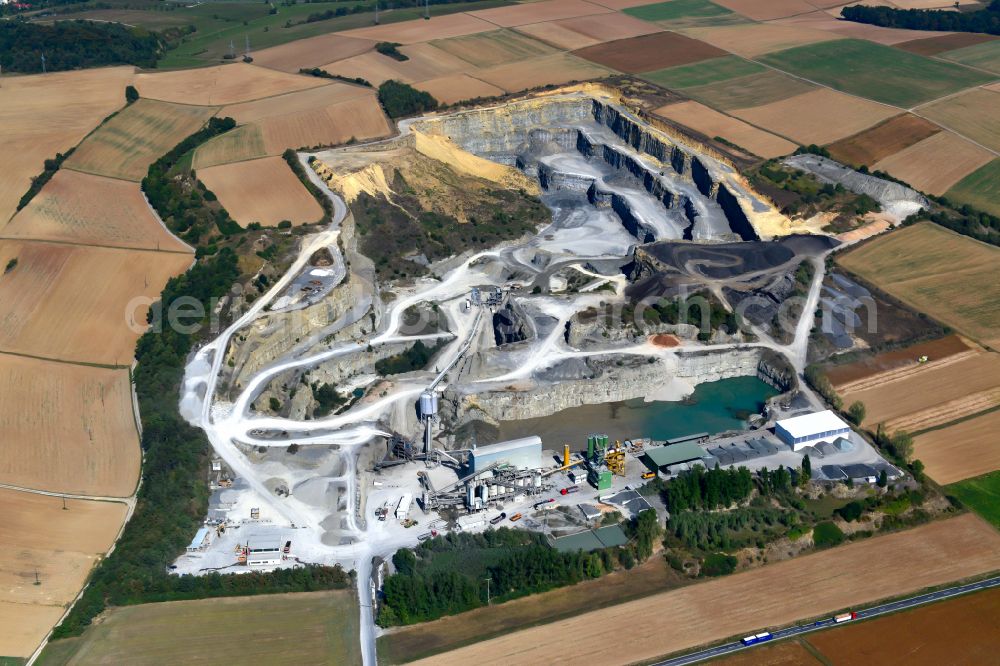 Aerial image Waldbüttelbrunn - Building and production halls on the premises AMW | Asphaltmischwerk Rossbrunn in Waldbuettelbrunn in the state Bavaria, Germany