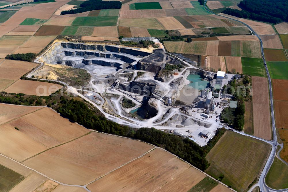 Waldbüttelbrunn from above - Building and production halls on the premises AMW | Asphaltmischwerk Rossbrunn in Waldbuettelbrunn in the state Bavaria, Germany