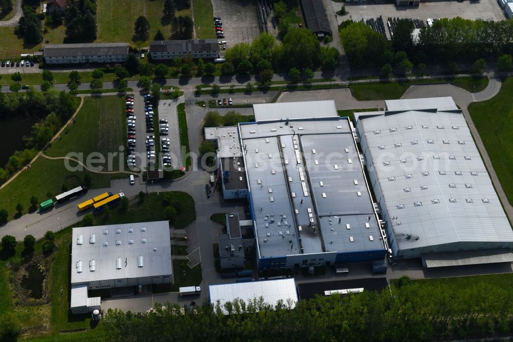 Märkisch Linden from the bird's eye view: Building and production halls on the premises of Atotech Deutschland GmbH on Ahornallee in Maerkisch Linden in the state Brandenburg, Germany