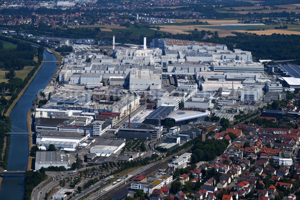 Heilbronn from the bird's eye view: Buildings and production halls on the vehicle construction site of Audi AG on river Neckar in Heilbronn in the state Baden-Wurttemberg, Germany