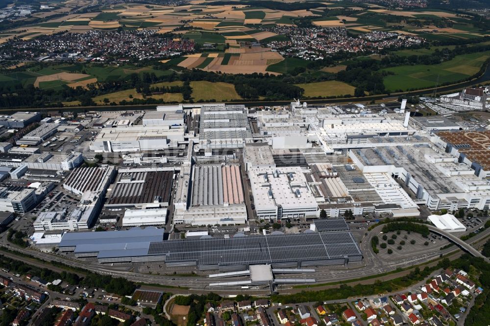 Heilbronn from the bird's eye view: Buildings and production halls on the vehicle construction site of Audi AG on river Neckar in Heilbronn in the state Baden-Wurttemberg, Germany