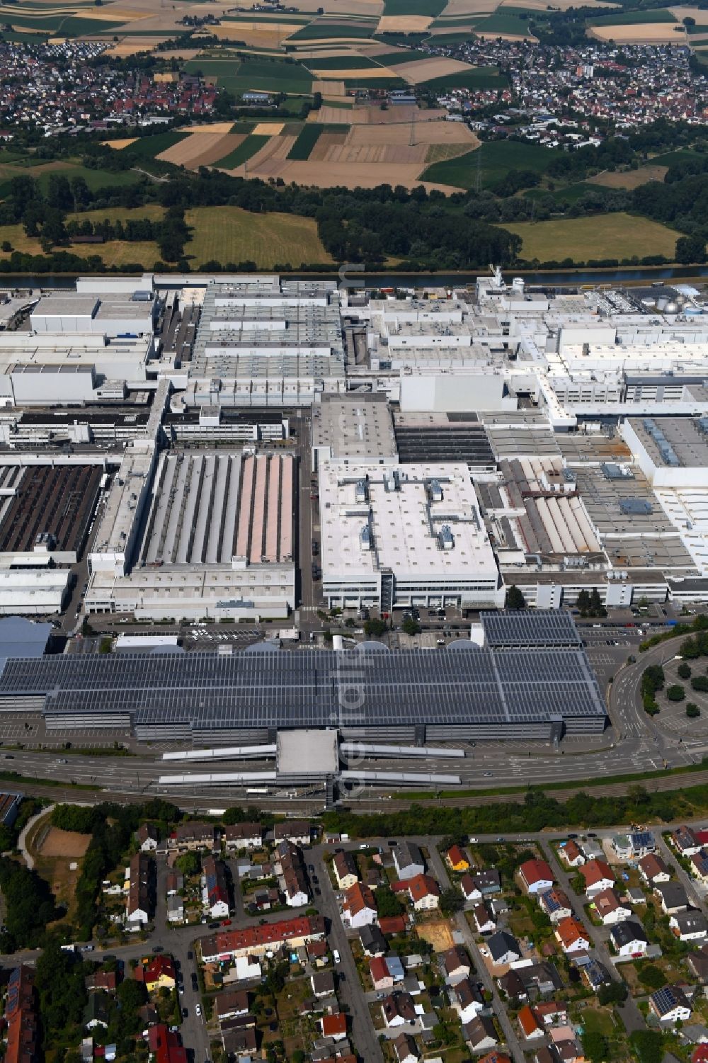 Aerial image Heilbronn - Buildings and production halls on the vehicle construction site of Audi AG on river Neckar in Heilbronn in the state Baden-Wurttemberg, Germany