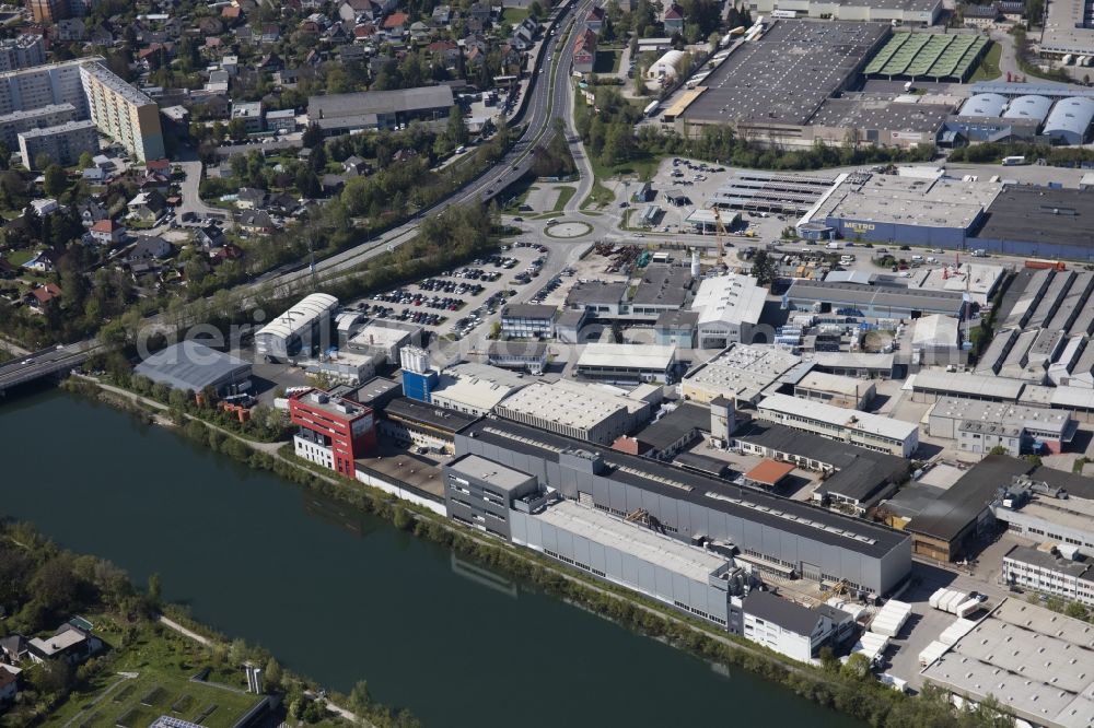 Wels from above - Building and production halls on the premises of Avenarius-Agro GmbH on Industriestrasse in Wels in Oberoesterreich, Austria