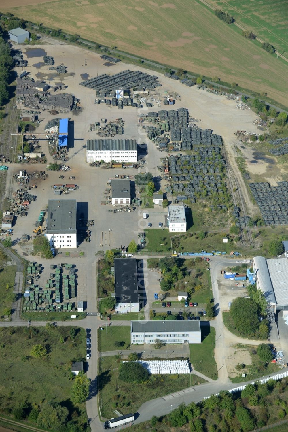 Rockensußra from the bird's eye view: Building and production halls on the premises of Battle Tank Dismantling GmbH Koch (BTD) in Rockensussra in the state Thuringia