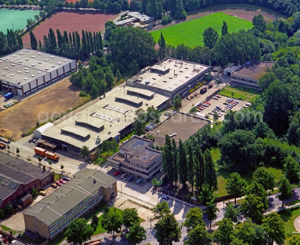 Berlin from above - Building and production halls on the premises of BAV Hagen Batterie on Blomberger Weg in the district Reinickendorf in Berlin, Germany