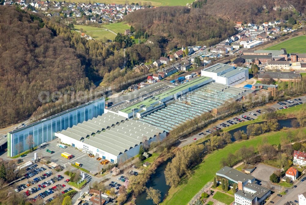 Hagen from the bird's eye view: Building and production halls on the premises of Bilstein Handel KG Im Weinhof in the district Hohenlimburg in Hagen in the state North Rhine-Westphalia