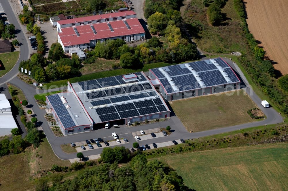 Grünsfeld from the bird's eye view: Building and production halls on the premises of Bohlenof GmbH on Waltersberg in Gruensfeld in the state Baden-Wurttemberg, Germany