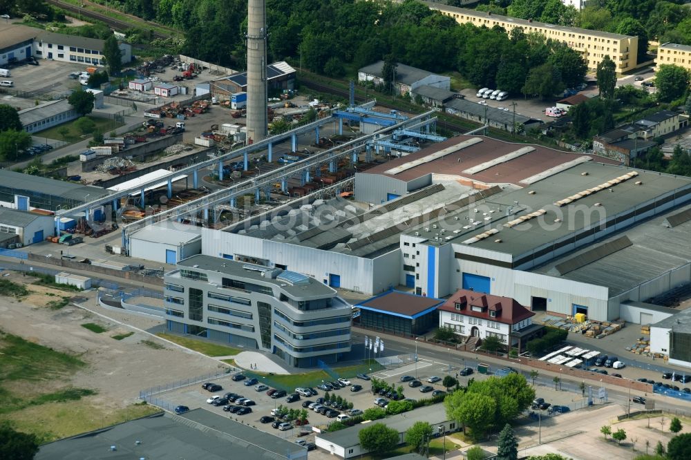 Aerial image Magdeburg - Administrative building and production halls on the work area of the FAM Magdeburger Foerderanlagen und Baumaschinen GmbH in Magdeburg in the federal state Saxony-Anhalt, Germany