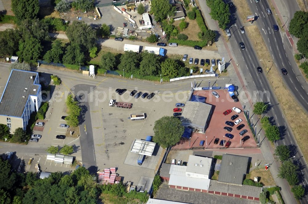 Berlin from above - Building and production halls on the premises of Baethge Baustoffe GmbH & Co. KG Am Juliusturm in the district Spandau in Berlin, Germany