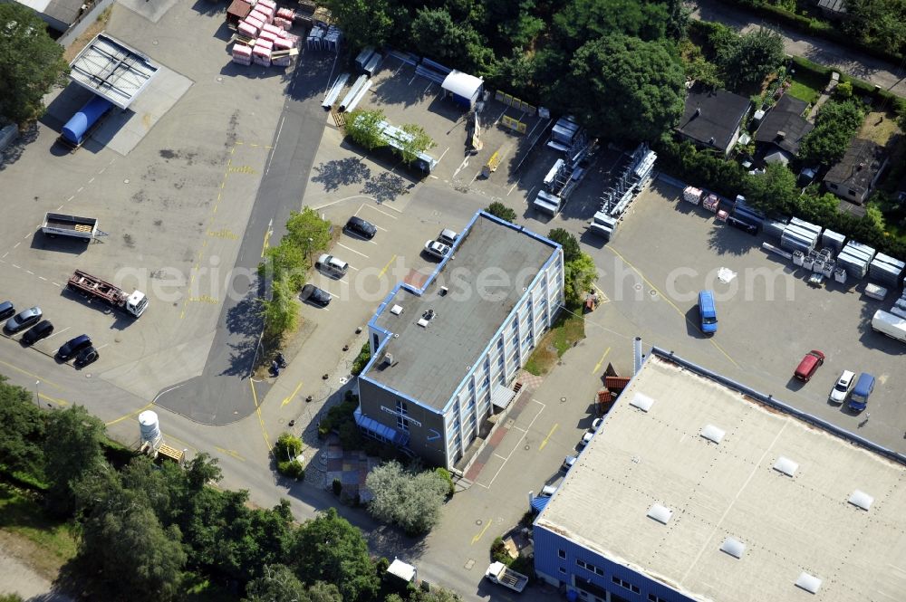 Berlin from above - Building and production halls on the premises of Baethge Baustoffe GmbH & Co. KG Am Juliusturm in the district Spandau in Berlin, Germany