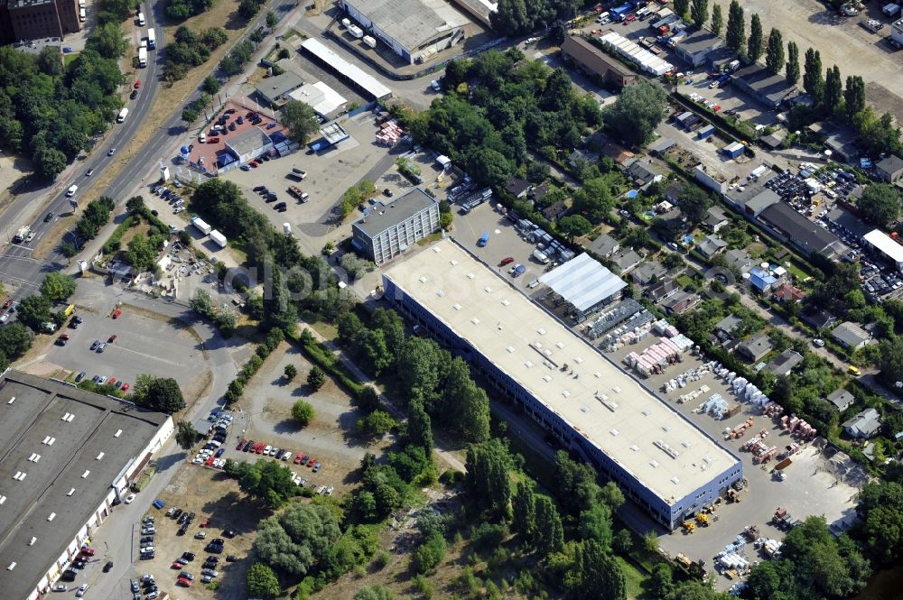 Berlin from above - Building and production halls on the premises of Baethge Baustoffe GmbH & Co. KG Am Juliusturm in the district Spandau in Berlin, Germany