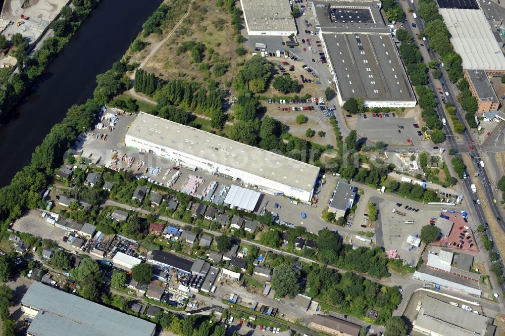 Berlin from above - Building and production halls on the premises of Baethge Baustoffe GmbH & Co. KG Am Juliusturm in the district Spandau in Berlin, Germany