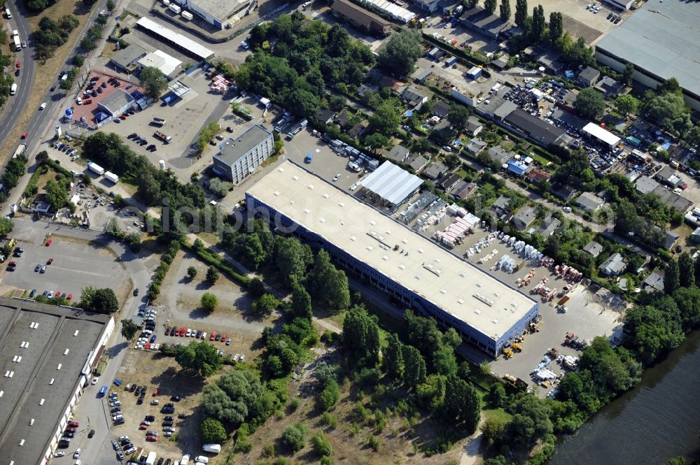 Berlin from above - Building and production halls on the premises of Baethge Baustoffe GmbH & Co. KG Am Juliusturm in the district Spandau in Berlin, Germany