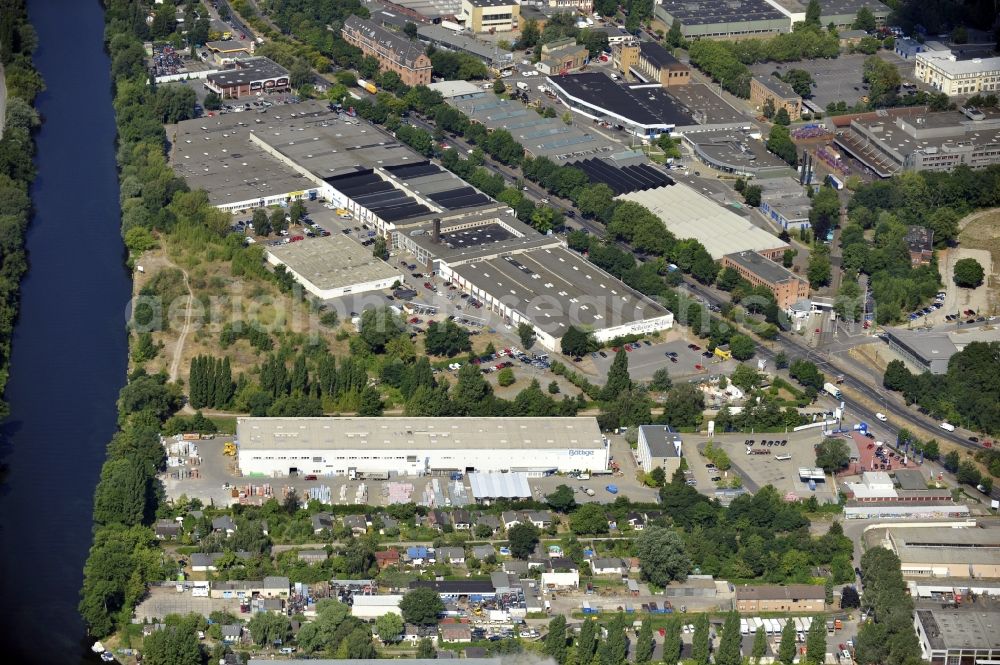 Berlin from above - Building and production halls on the premises of Baethge Baustoffe GmbH & Co. KG Am Juliusturm in the district Spandau in Berlin, Germany