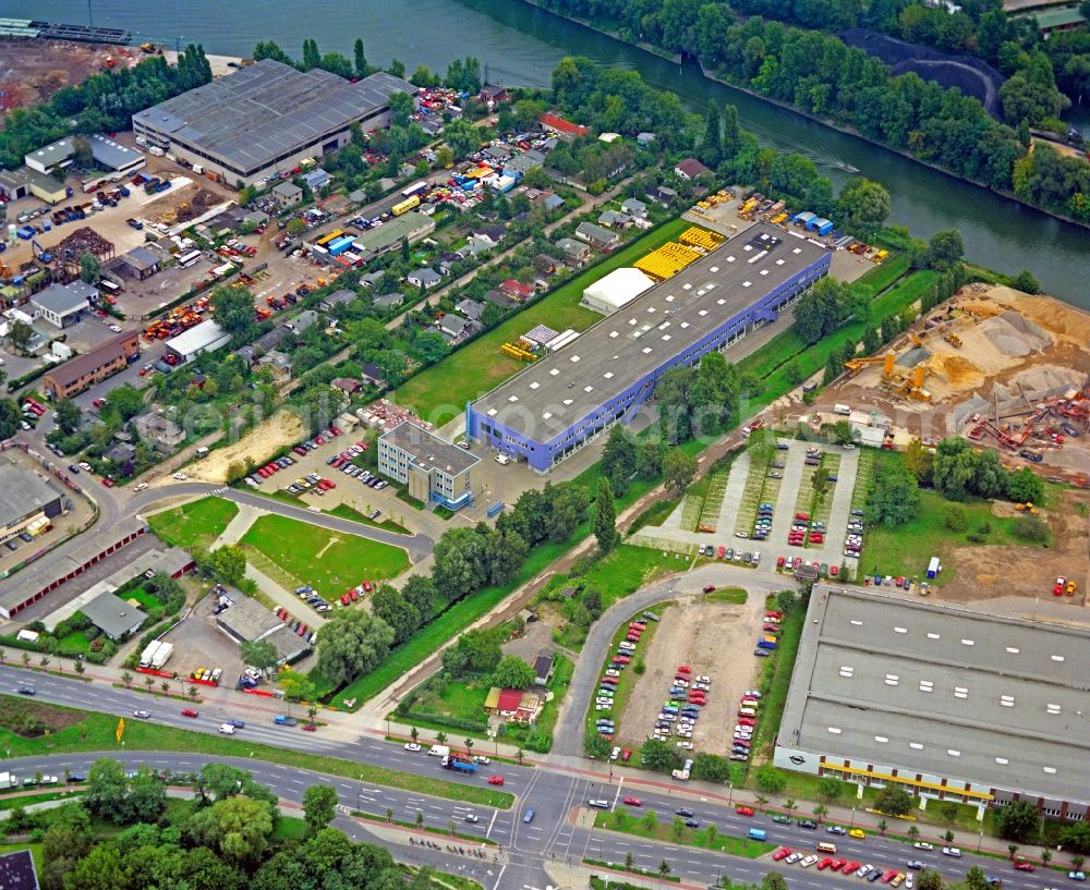 Berlin from above - Building and production halls on the premises of Baethge Baustoffe GmbH & Co. KG Am Juliusturm in the district Spandau in Berlin, Germany