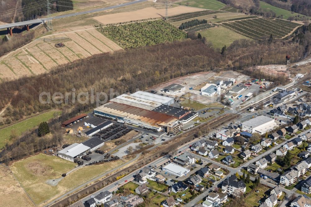 Bestwig from the bird's eye view: Building and production halls on the premises of M. Busch GmbH & Co. KG on Ruhrstrasse in Bestwig in the state North Rhine-Westphalia, Germany