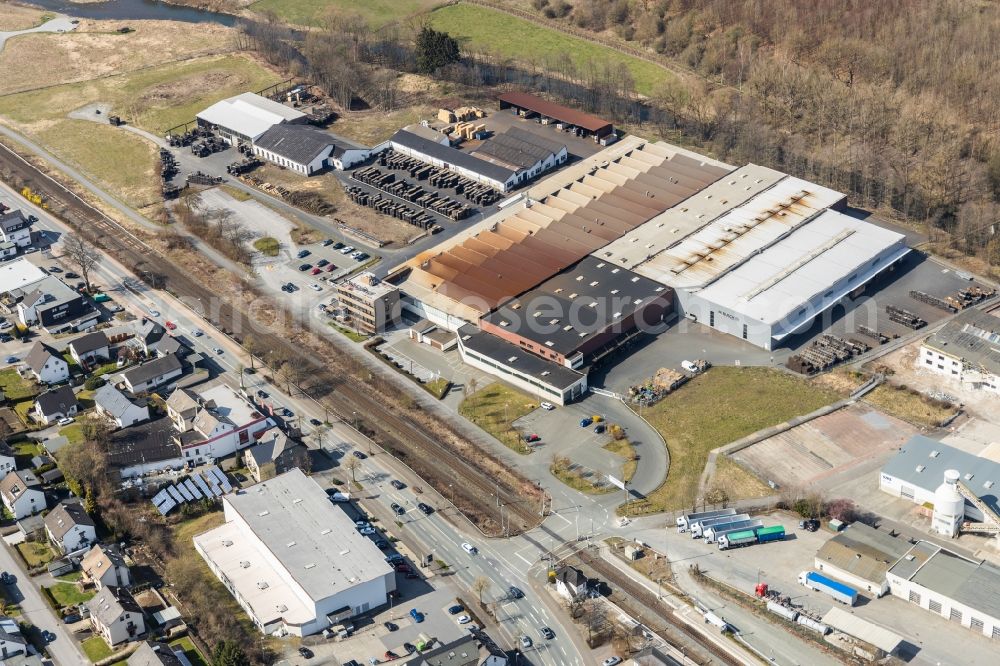 Aerial photograph Bestwig - Building and production halls on the premises of M. Busch GmbH & Co. KG on Ruhrstrasse in Bestwig in the state North Rhine-Westphalia, Germany