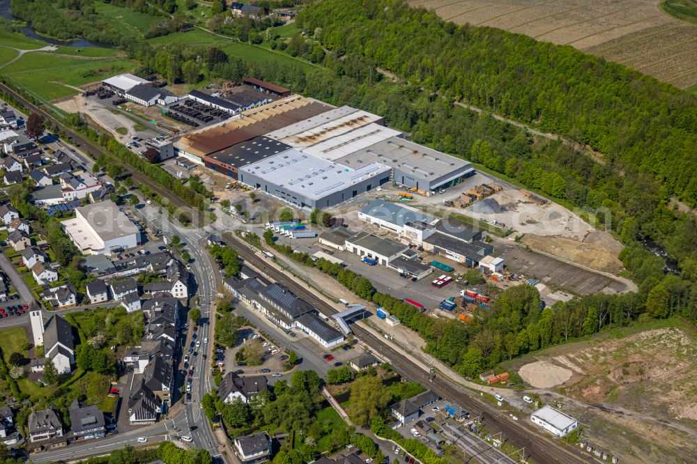 Bestwig from the bird's eye view: Building and production halls on the premises of M. Busch GmbH & Co. KG on Ruhrstrasse in Bestwig in the state North Rhine-Westphalia, Germany