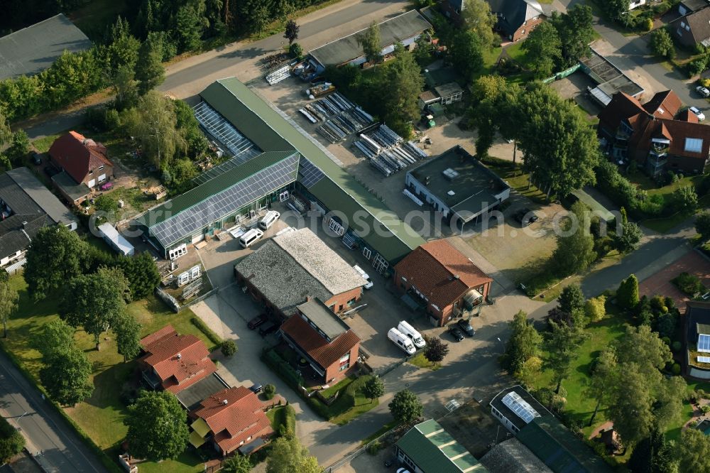 Munster from the bird's eye view: Building and production halls on the premises of Busse Alu-Bau GmbH An der Raubkammer in Munster in the state Lower Saxony