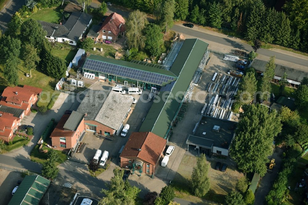 Aerial photograph Munster - Building and production halls on the premises of Busse Alu-Bau GmbH An der Raubkammer in Munster in the state Lower Saxony