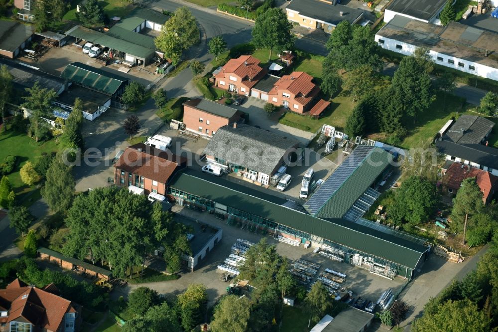 Munster from the bird's eye view: Building and production halls on the premises of Busse Alu-Bau GmbH An der Raubkammer in Munster in the state Lower Saxony