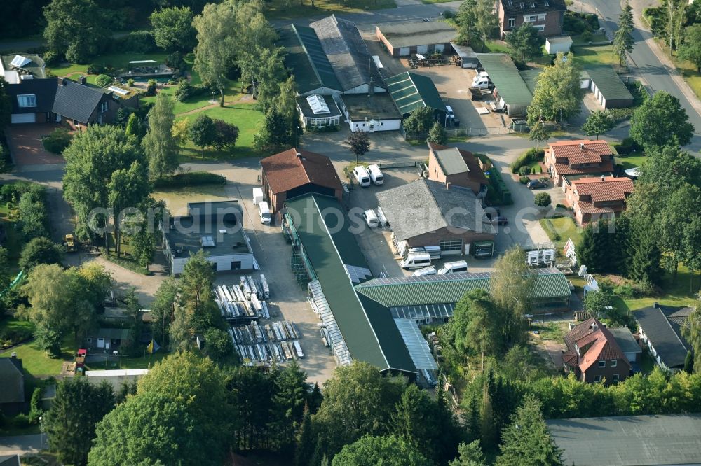 Aerial image Munster - Building and production halls on the premises of Busse Alu-Bau GmbH An der Raubkammer in Munster in the state Lower Saxony