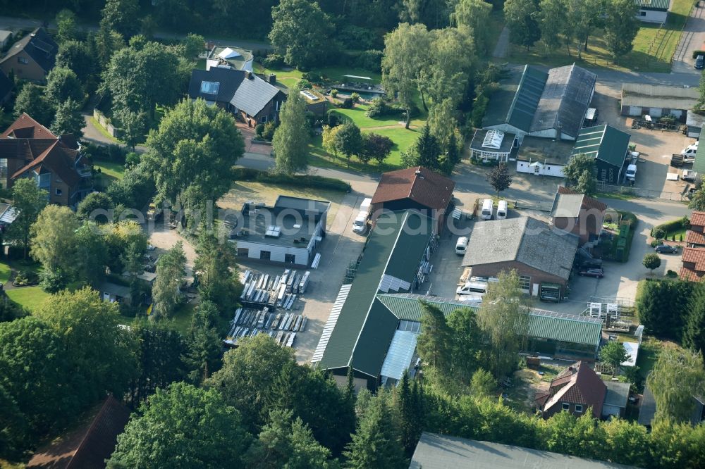 Aerial photograph Munster - Building and production halls on the premises of Busse Alu-Bau GmbH An der Raubkammer in Munster in the state Lower Saxony