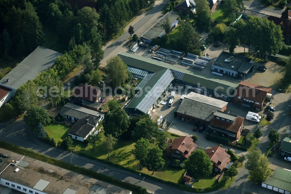 Munster from the bird's eye view: Building and production halls on the premises of Busse Alu-Bau GmbH An der Raubkammer in Munster in the state Lower Saxony