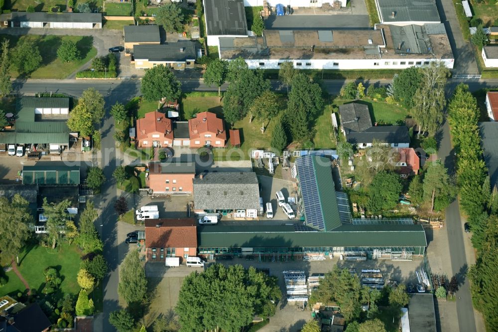 Munster from the bird's eye view: Building and production halls on the premises of Busse Alu-Bau GmbH An der Raubkammer in Munster in the state Lower Saxony