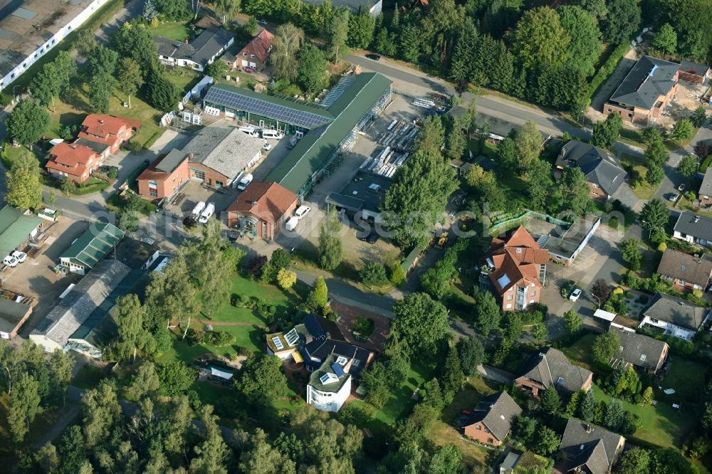 Munster from the bird's eye view: Building and production halls on the premises of Busse Alu-Bau GmbH An der Raubkammer in Munster in the state Lower Saxony