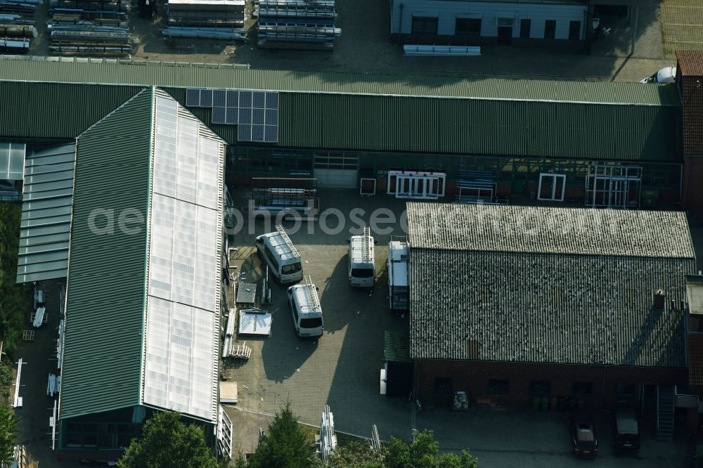 Aerial image Munster - Building and production halls on the premises of Busse Alu-Bau GmbH An der Raubkammer in Munster in the state Lower Saxony